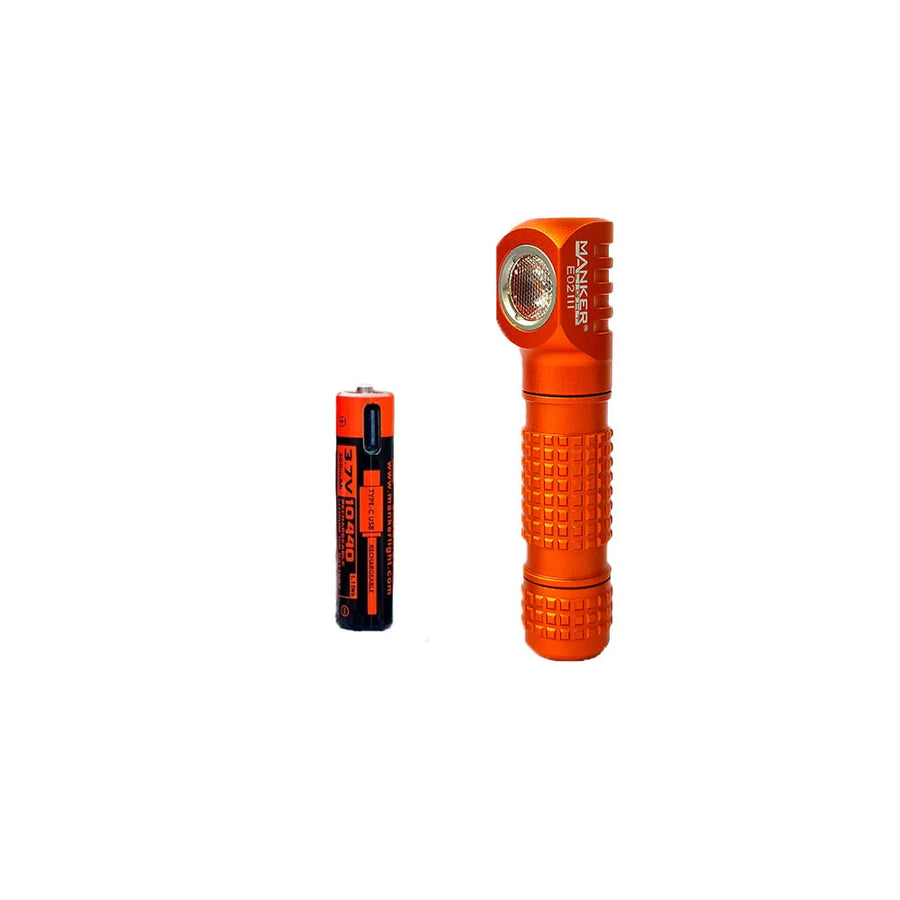 Orange flashlight with battery on a white background