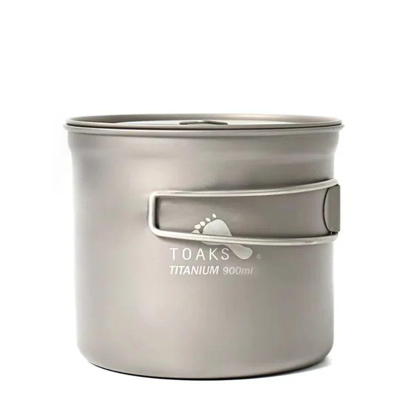 Titanium camping mug with handle on a white background, featuring the TOAKS brand.