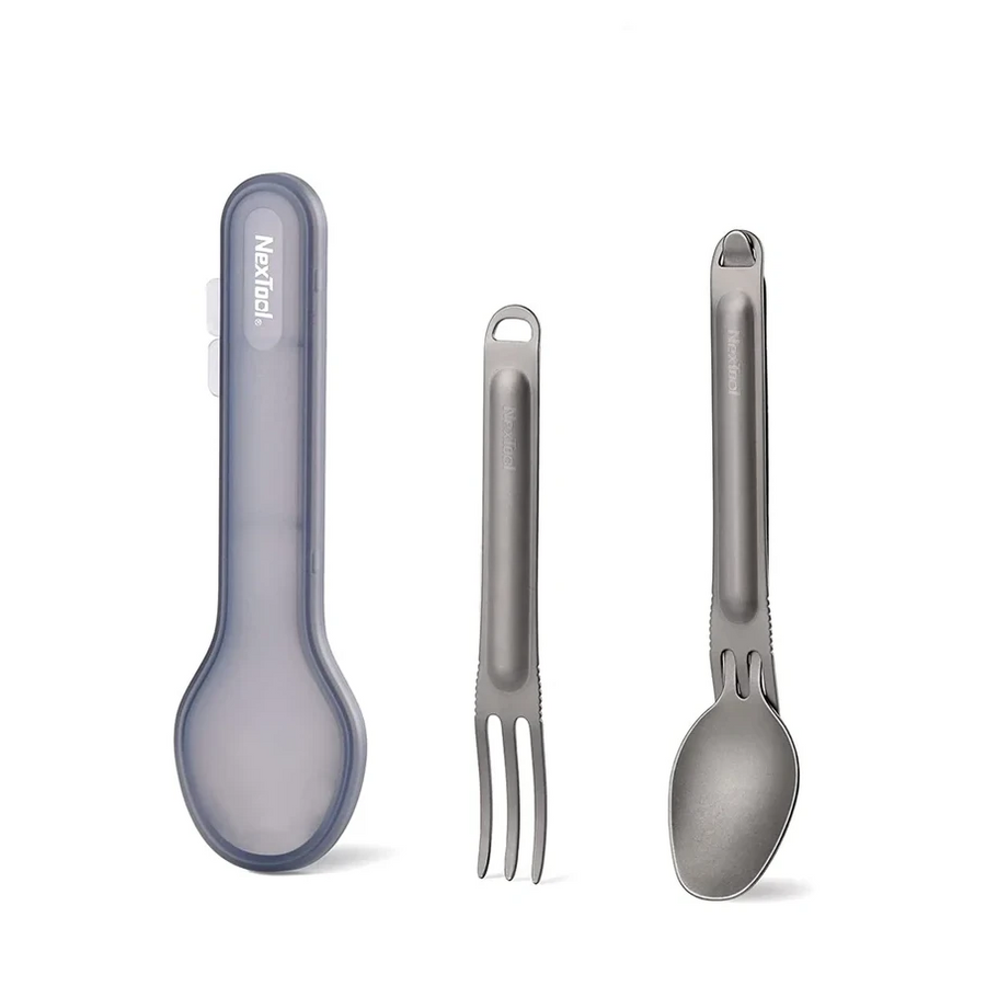 Set of three utensils including a spoon, fork, and knife on a white background.