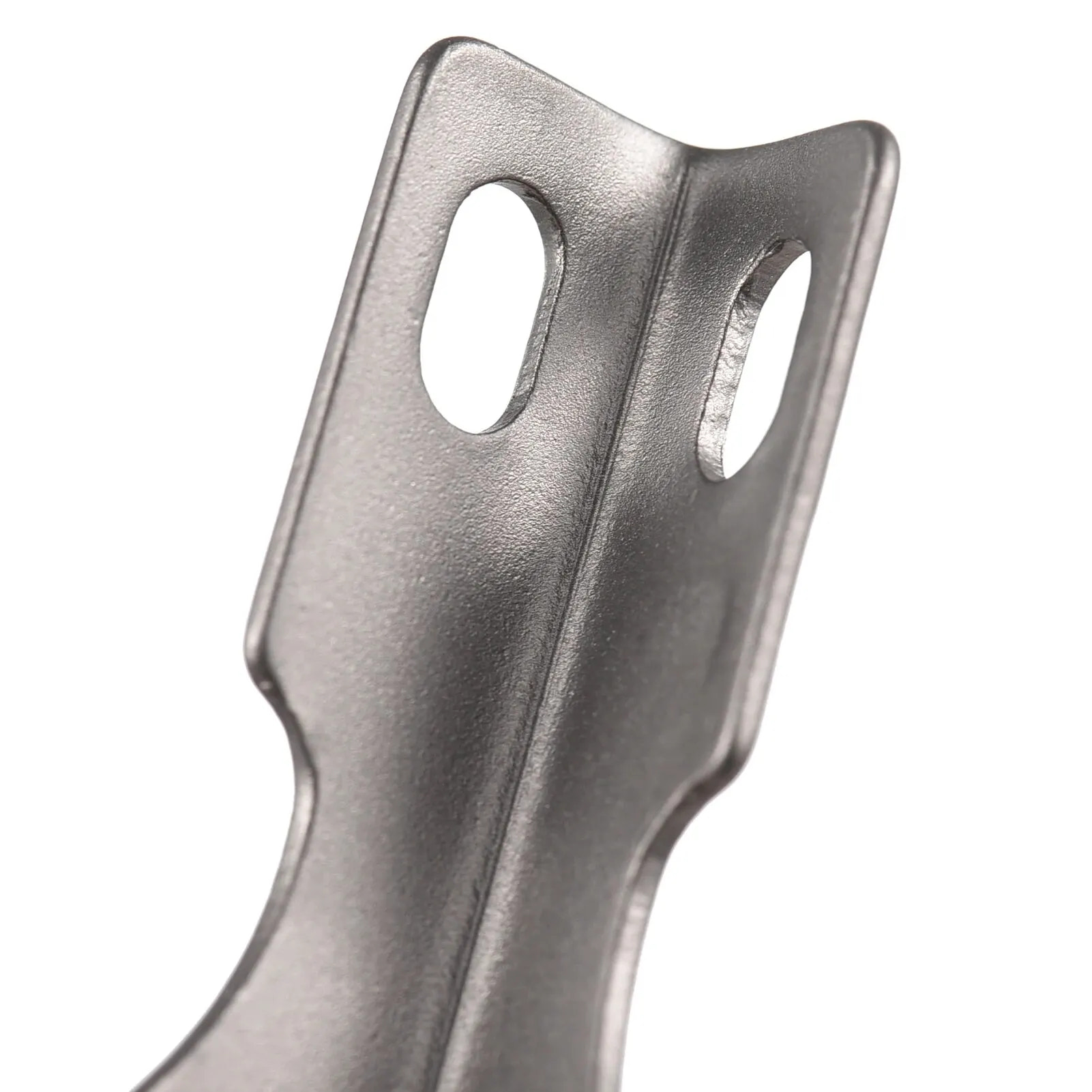 Metallic object with a textured surface on a white background