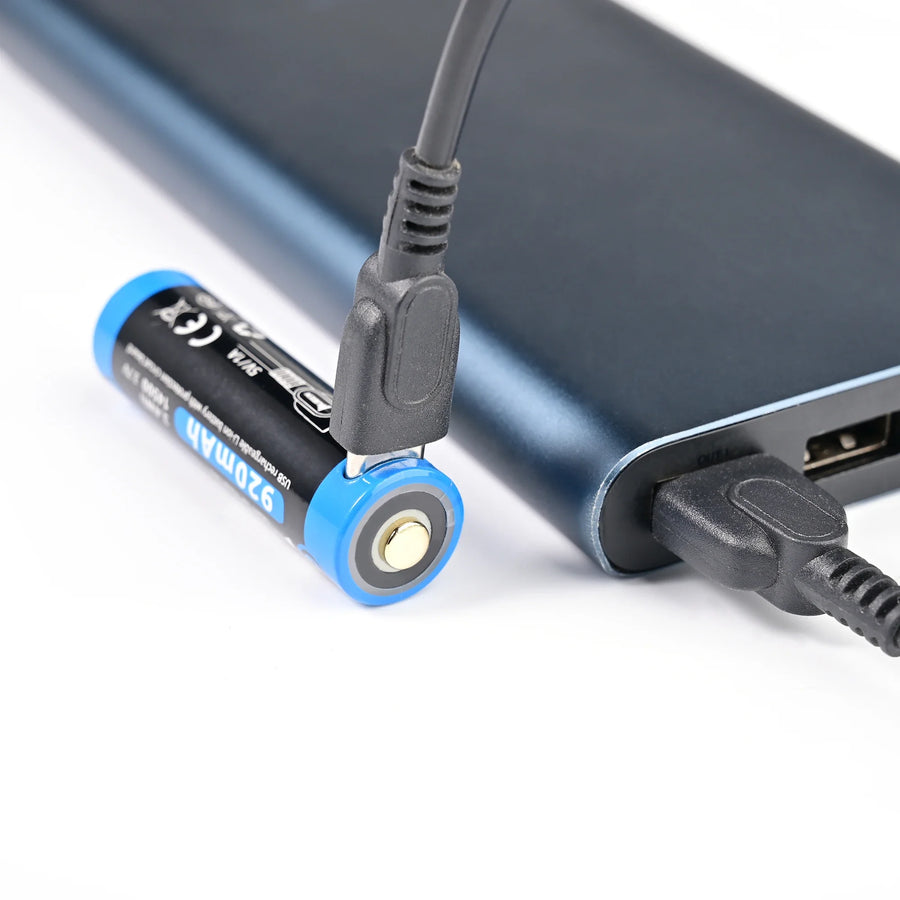 Battery pack with USB cable and battery attached on a white background