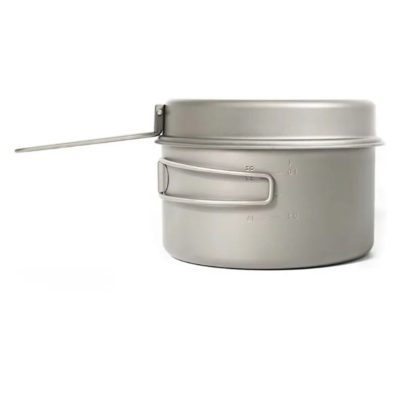 Metal camping pot on a white background