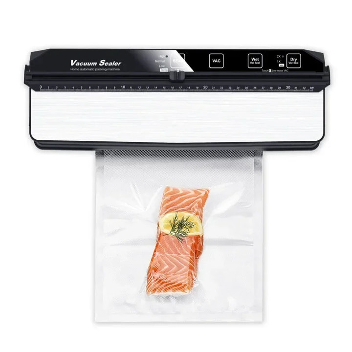 Vacuum sealer with a piece of salmon being vacuum-sealed on a white background