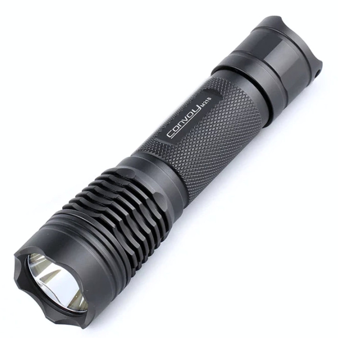 Black flashlight with 'Convoy' branding on a white background