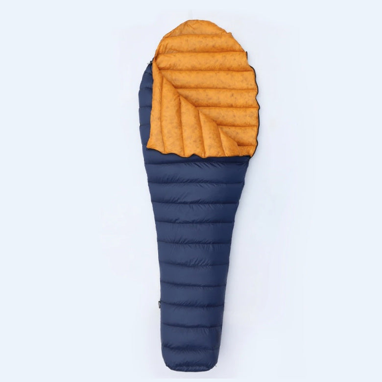 Blue and orange sleeping bag on a white background