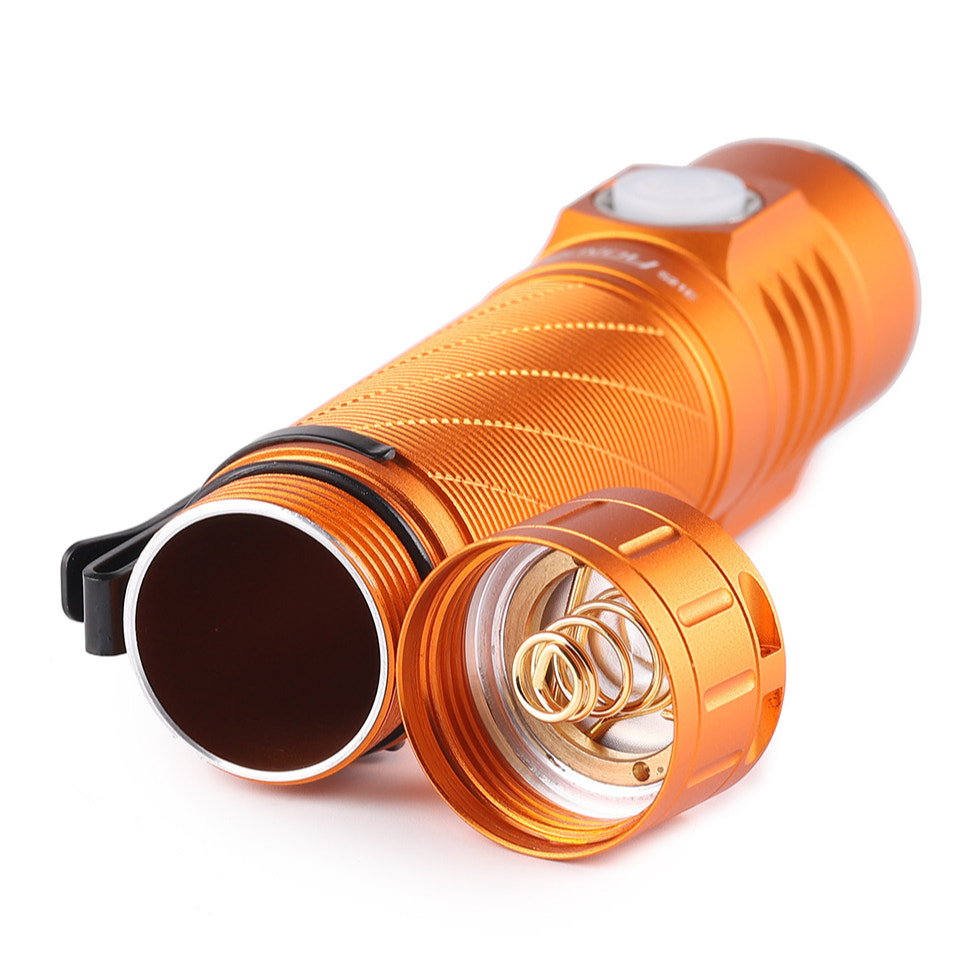 Orange flashlight on a white background