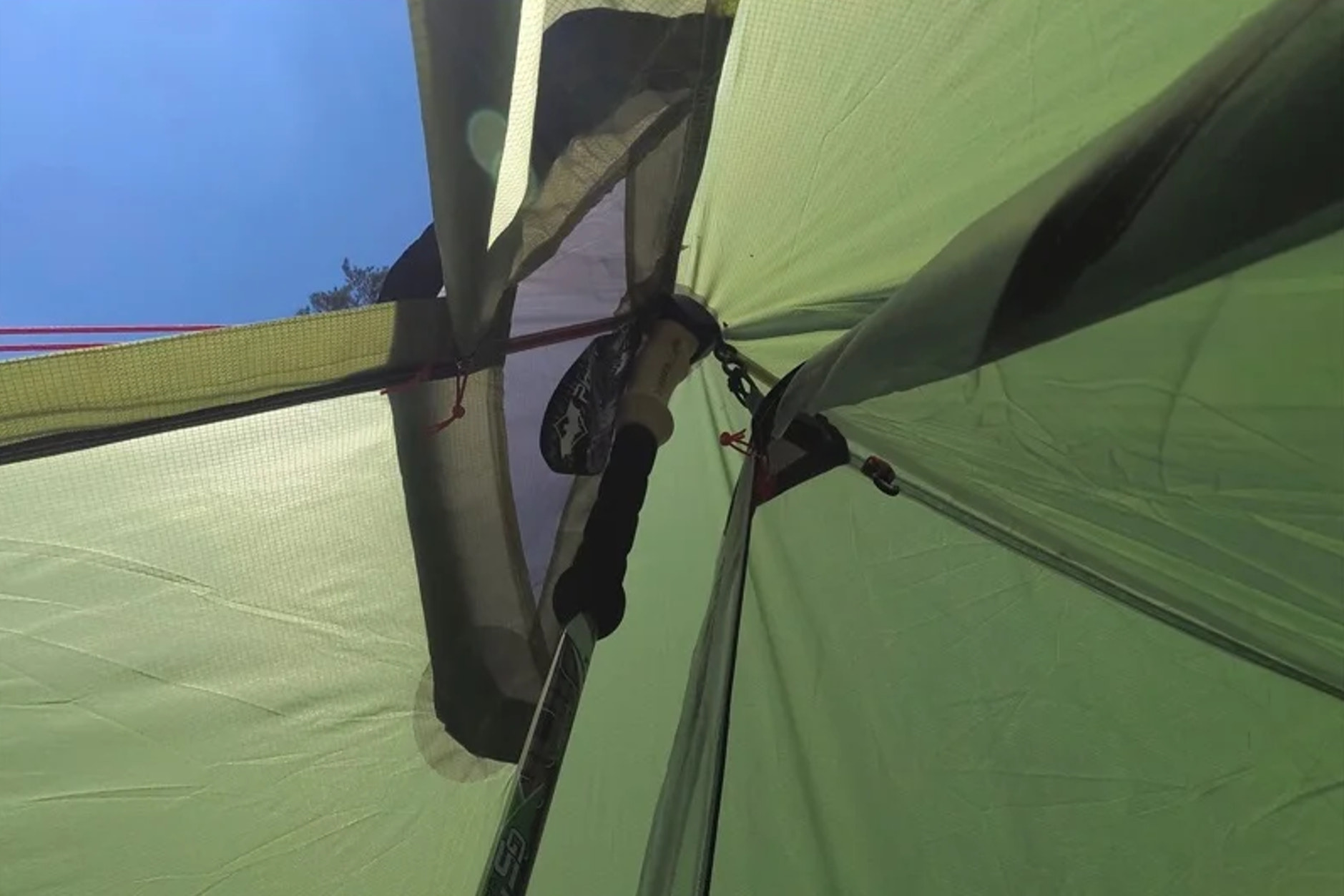 trekking pole inside tent