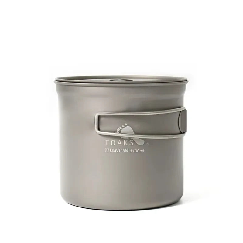 titanium mug with 'TOAKS' branding on a white background