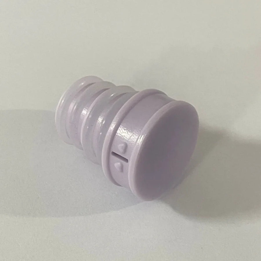 Purple plastic cap on a white background