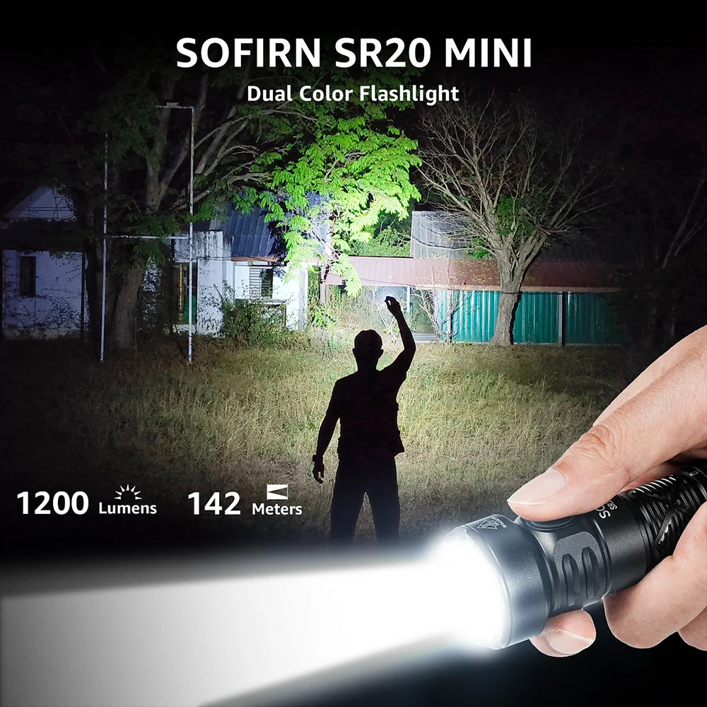 Person using a SOFIRN SR20 MINI dual color flashlight in a dark outdoor setting.