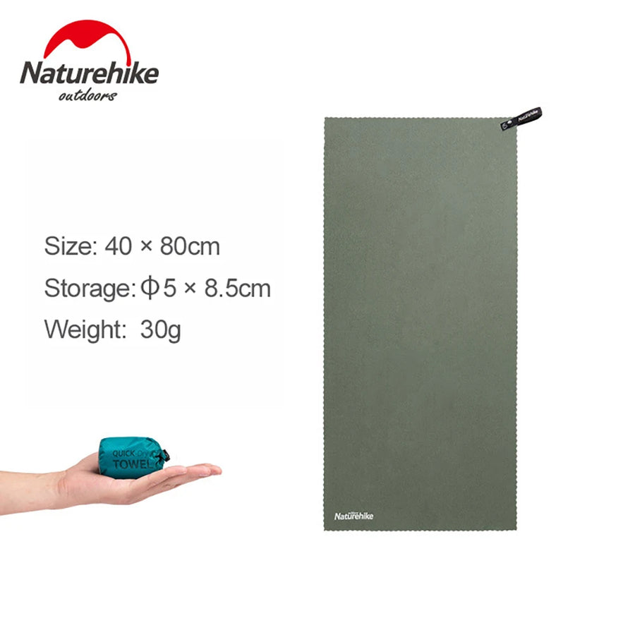 Green towel with Naturehike branding on a white background