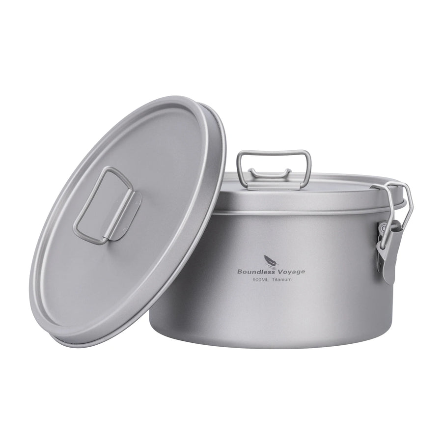 Camping pot with lid on a white background