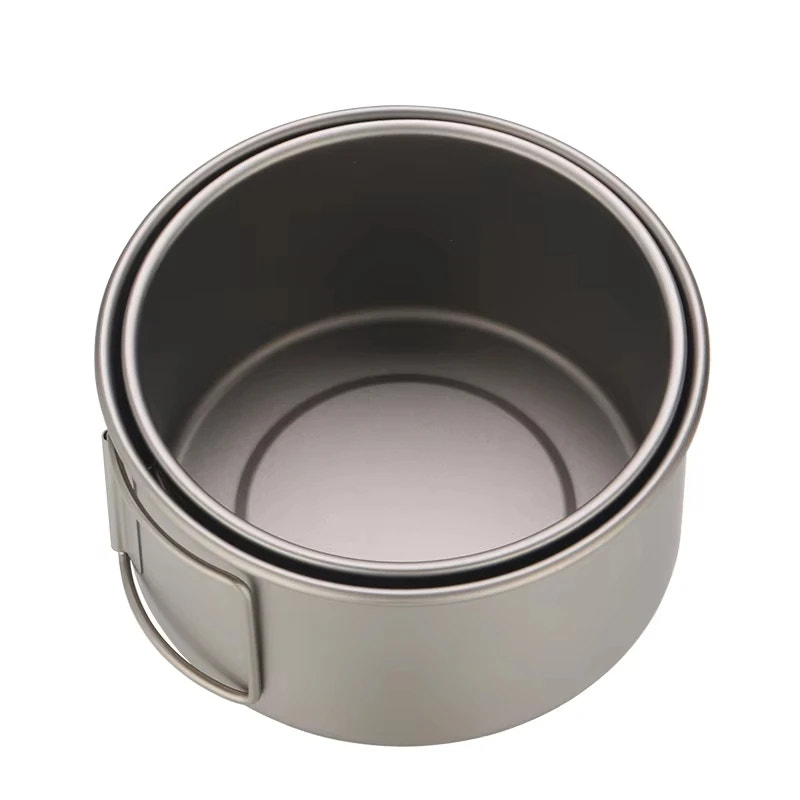 Stackable metal containers on a white background