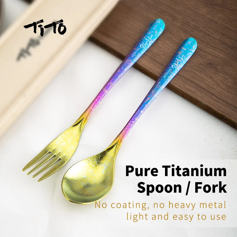 Pure Titanium Spoon and Fork set on a white surface with wooden background