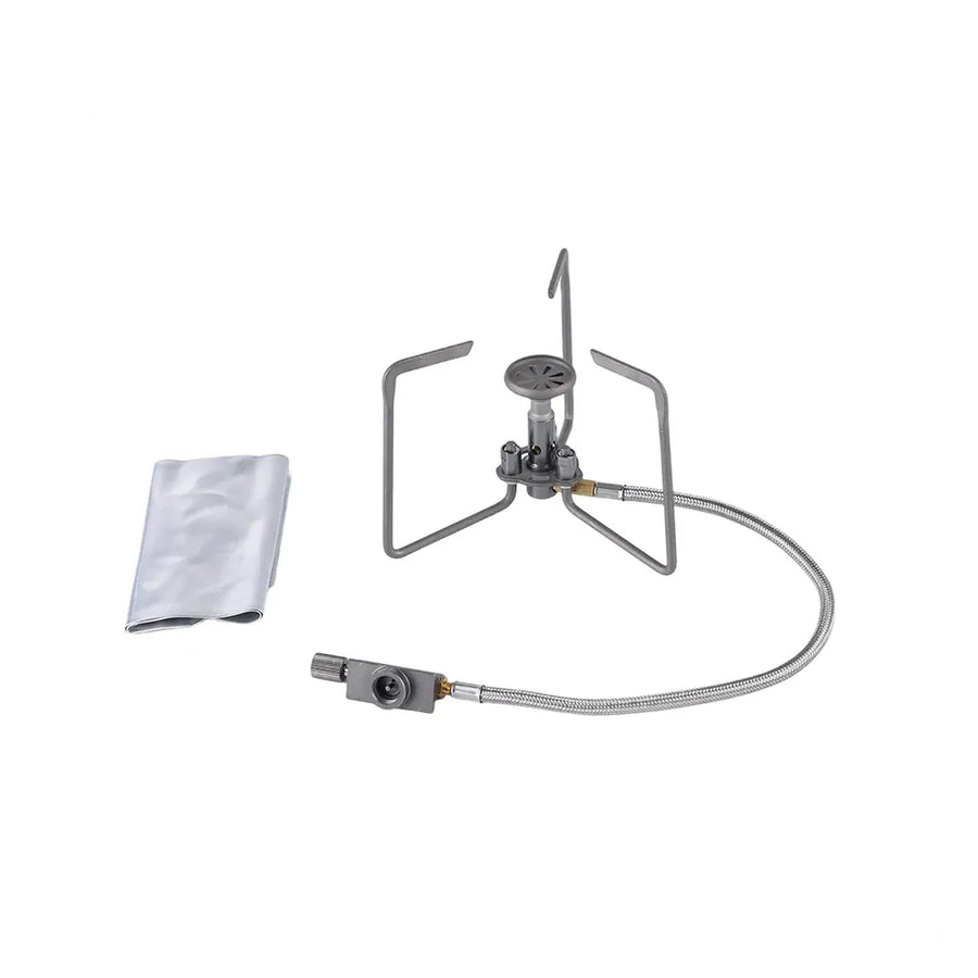 titanium camping stove with fuel canister on a white background