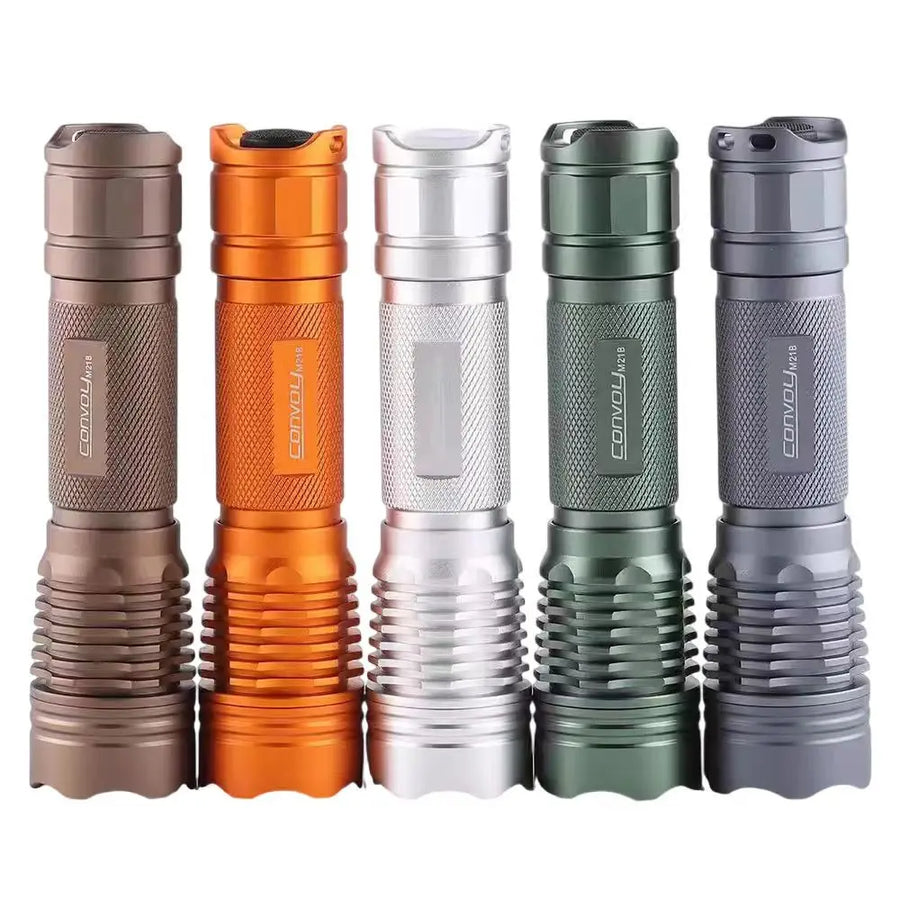 Five flashlights in different colors on a white background