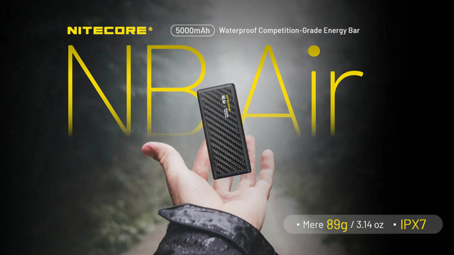 Nitecore NB Air energy bar held in a hand with product details on a dark background